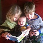 Three Siblings Share a Book